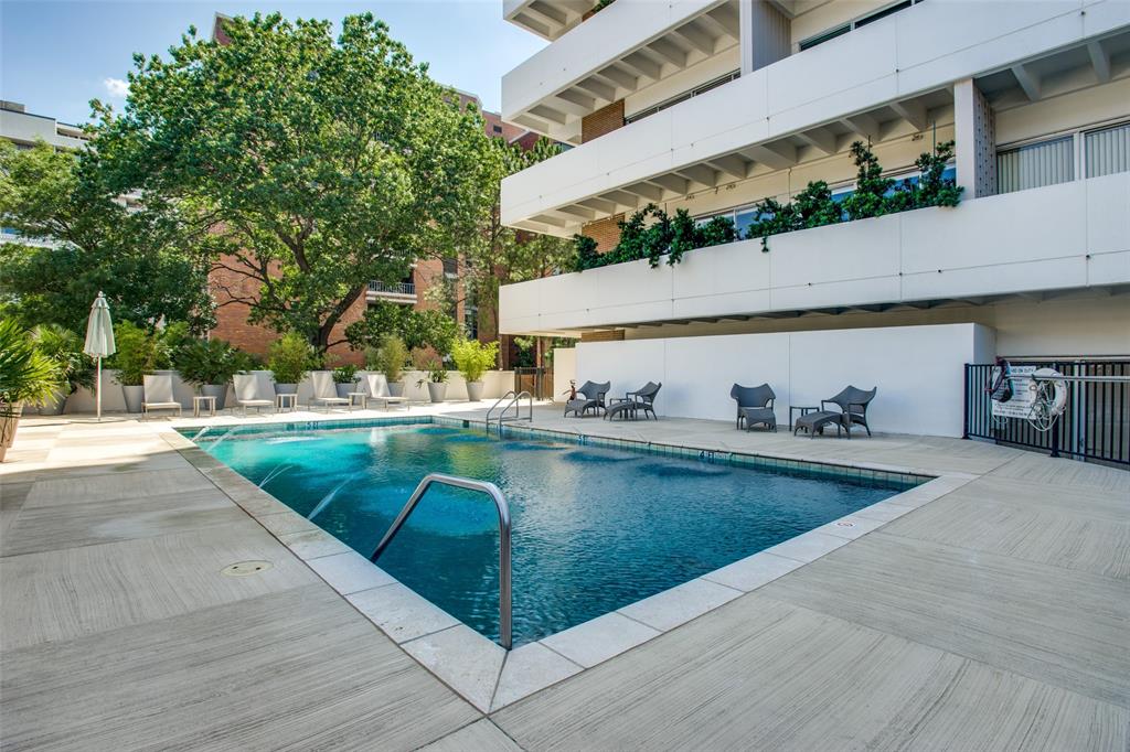 3601 Turtle Creek Boulevard, Unit 1006 Dallas, TX 75219 - Photo 22 of 28 a view of a swimming pool with outdoor seating