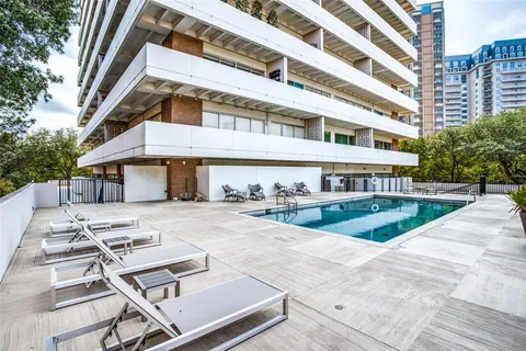 a view of a building with a swimming pool