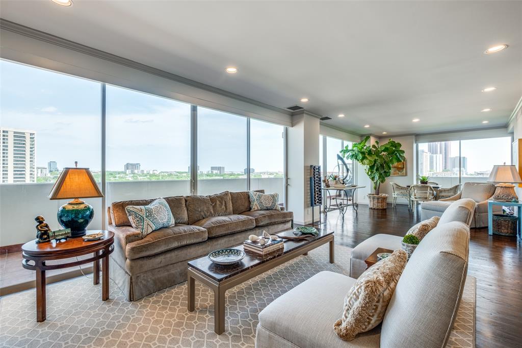 3601 Turtle Creek Boulevard, Unit 1006 Dallas, TX 75219 - Photo 3 of 28 a living room with furniture and a large window