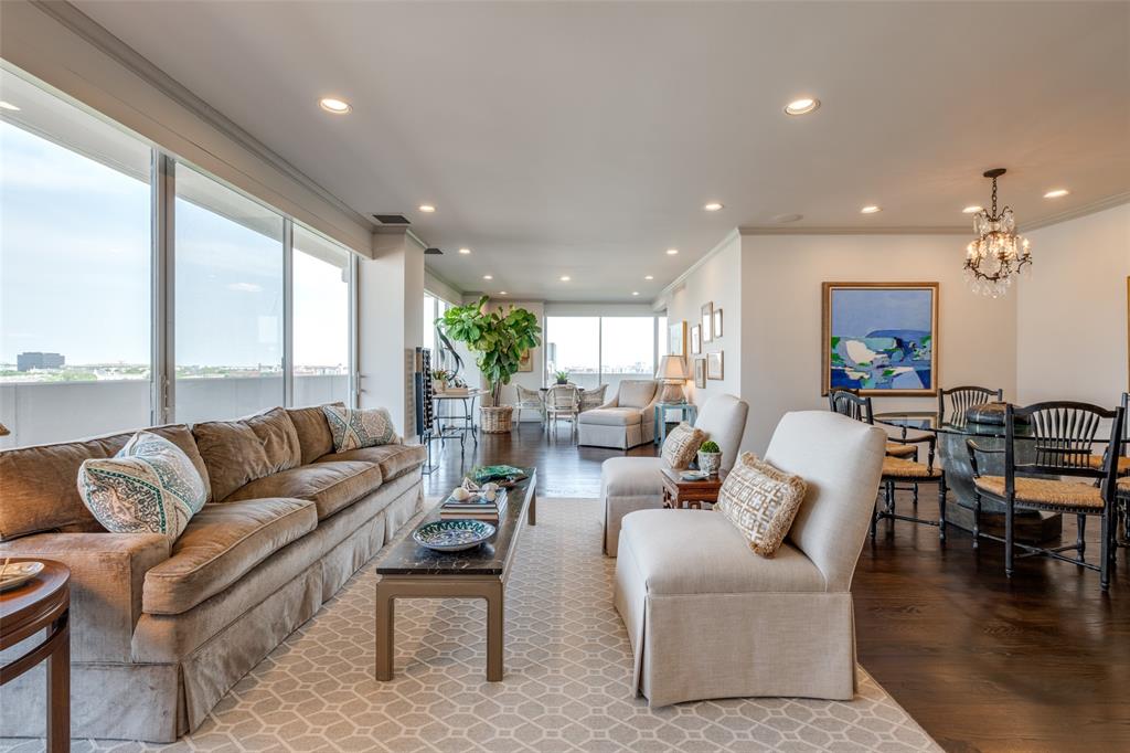 3601 Turtle Creek Boulevard, Unit 1006 Dallas, TX 75219 - Photo 7 of 28 a living room with furniture and a large window