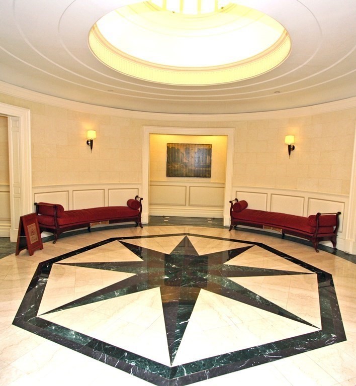 20 Rowes Wharf, Unit 402 Boston, MA 02110 - Photo 4 of 7 a view of a living room and kitchen