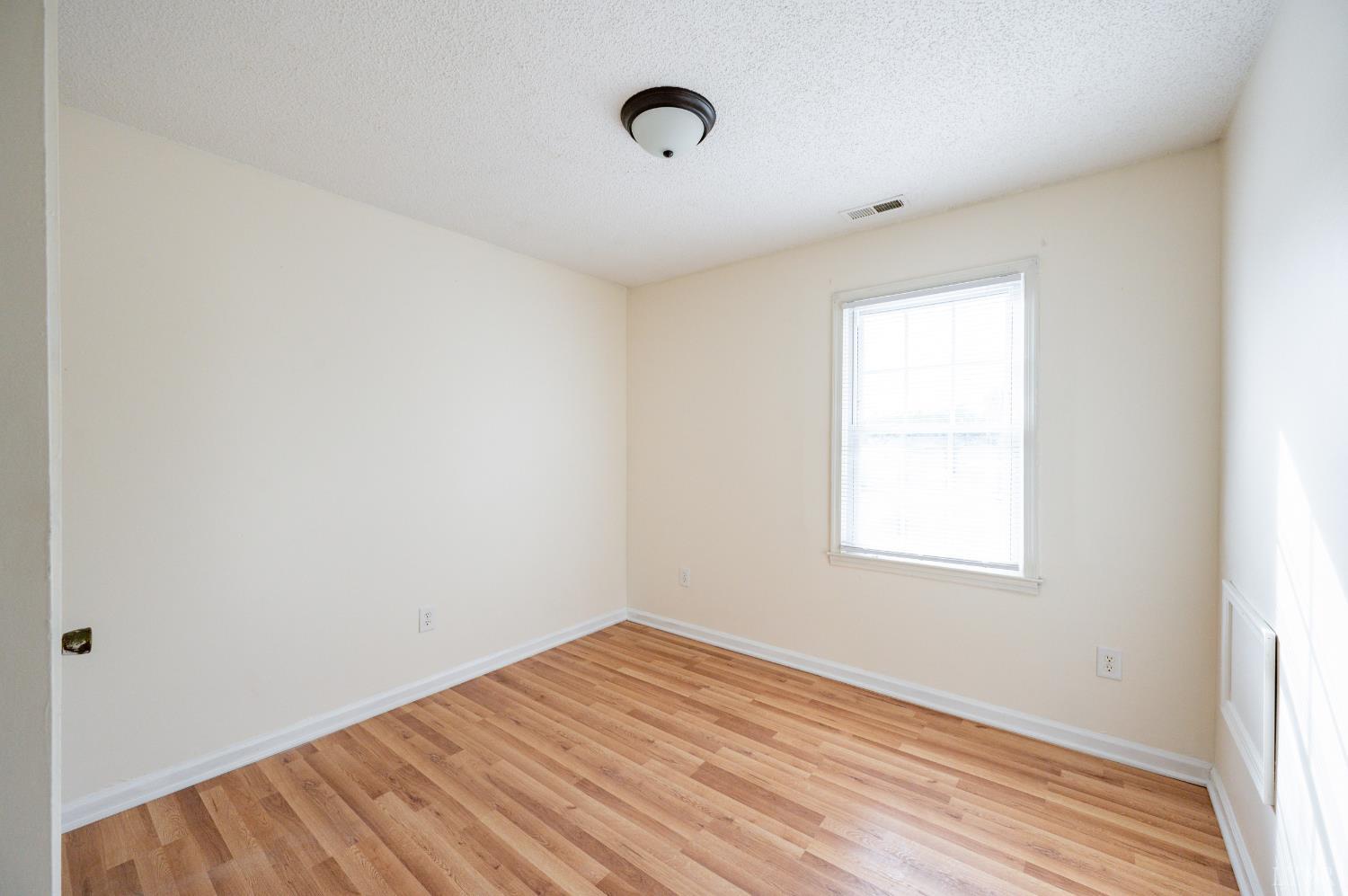 1114 Golden Leaf Road Nathalie, VA 24577 - Photo 22 of 32 an empty room with a window