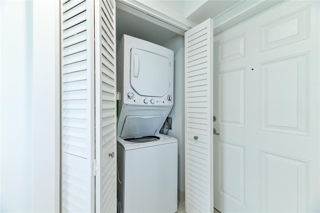 1021 Hillsboro Mile, Unit 308 Hillsboro Beach, FL 33062 - Photo 24 of 24 a utility room with dryer and washer