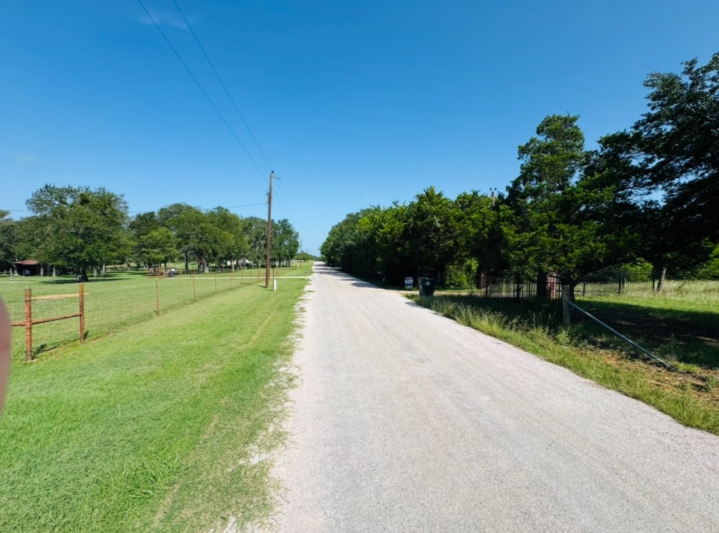 224 Crooked Hollow Road Elgin, TX 78621 - Photo 2 of 35 a view of a park with large trees