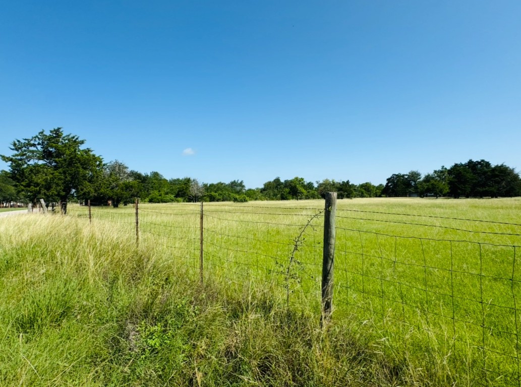 224 Crooked Hollow Road Elgin, TX 78621 - Photo 3 of 35 a view of a lake with a big yard