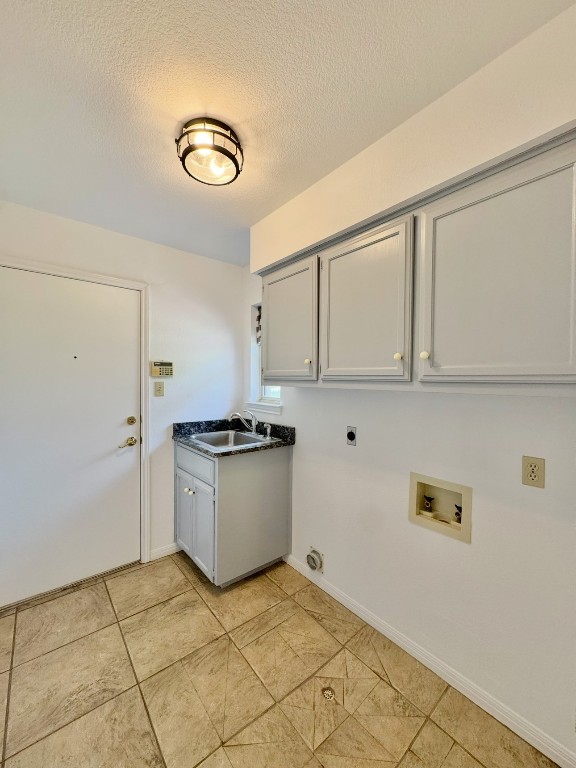 224 Crooked Hollow Road Elgin, TX 78621 - Photo 10 of 35 a kitchen with granite countertop a stove a sink and a refrigerator