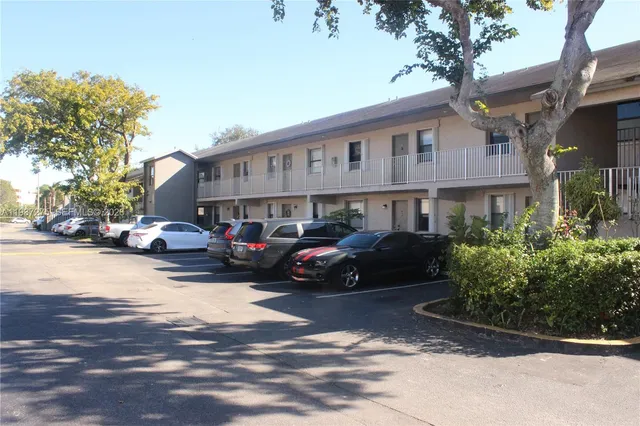 a view of a street with cars