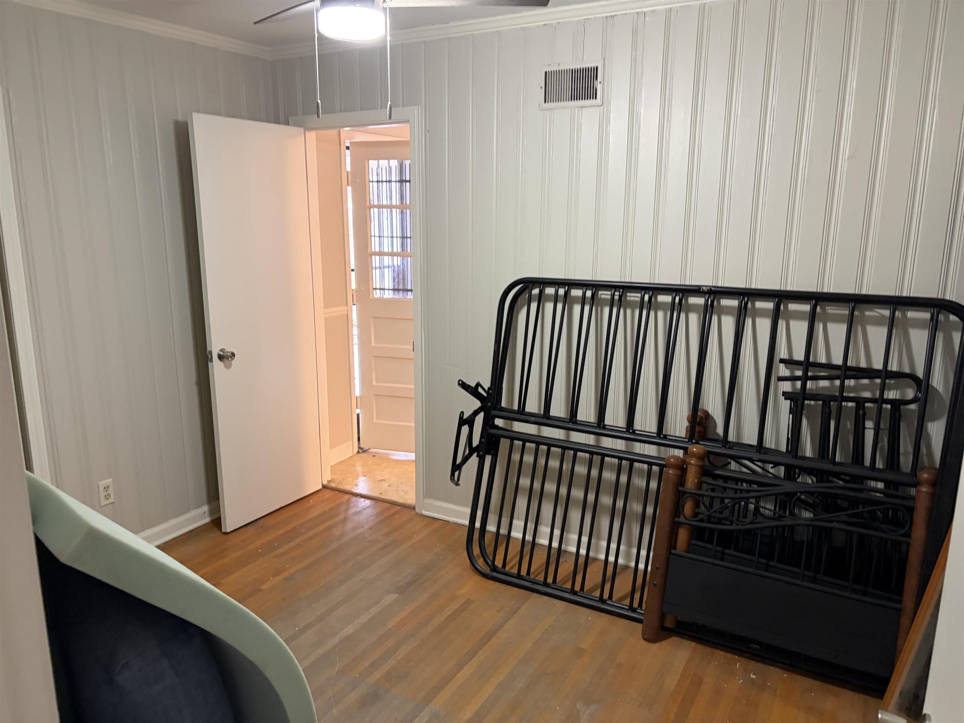 4928 Willow Road Memphis, TN 38117 - Photo 12 of 16 Bedroom featuring wood finished floors, crown molding, and ceiling fan
