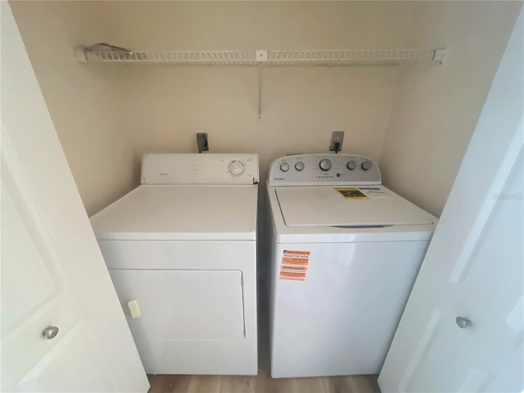 4345 Southwest 20th Lane, Unit 4345 Gainesville, FL 32607 - Photo 33 of 36 a utility room with dryer and washer