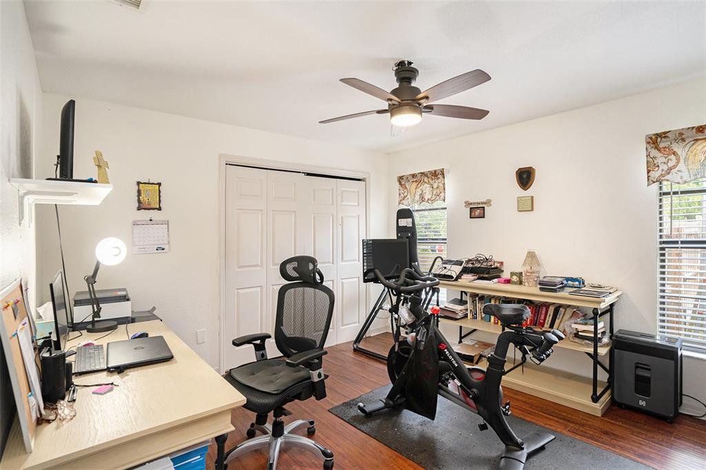 1619 Palace Court Valrico, FL 33594 - Photo 12 of 32 a view of a workspace with furniture and a window