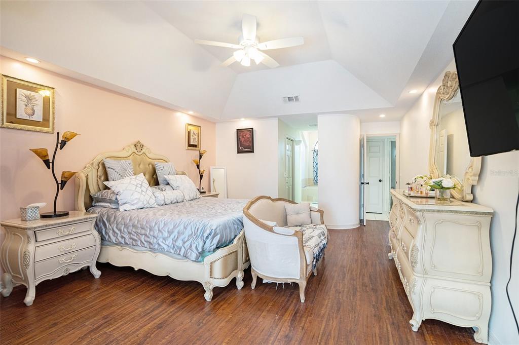 1619 Palace Court Valrico, FL 33594 - Photo 15 of 32 a bedroom with a bed and a couch