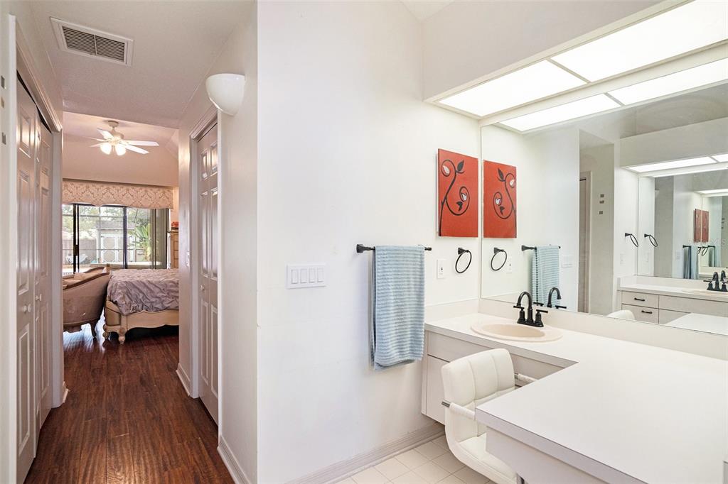 1619 Palace Court Valrico, FL 33594 - Photo 18 of 32 a en suite bathroom with a granite countertop sink