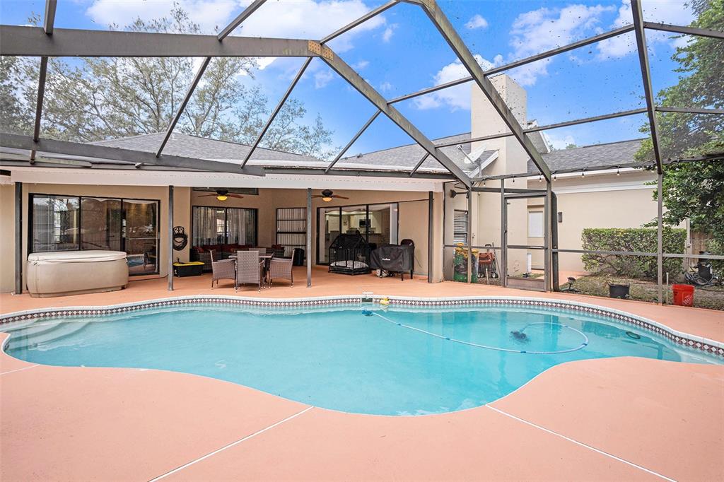 1619 Palace Court Valrico, FL 33594 - Photo 29 of 32 a view of a swimming pool with a patio