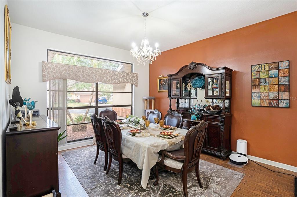 1619 Palace Court Valrico, FL 33594 - Photo 8 of 32 a view of a dining room with furniture window and outside view