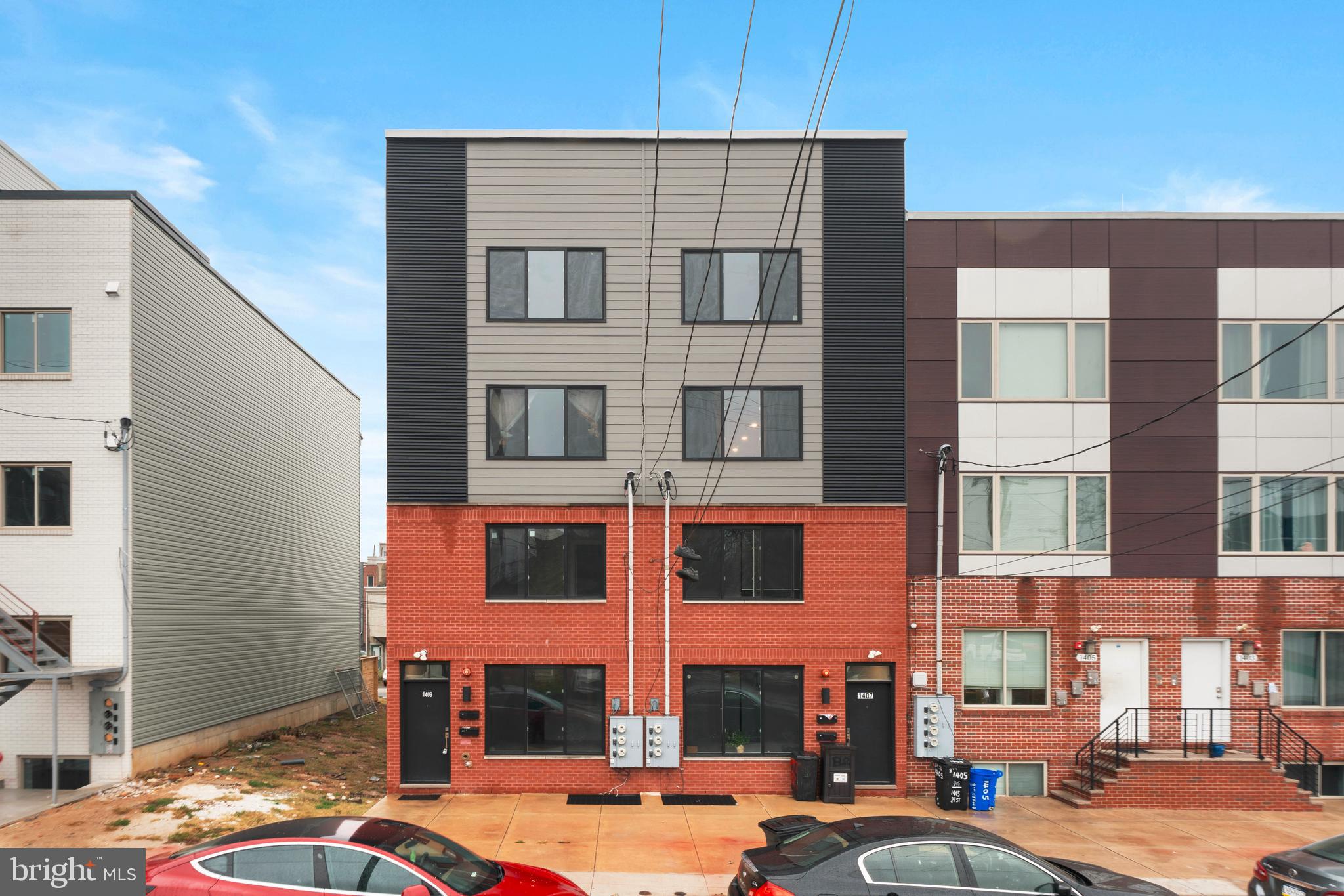 a city street lined with buildings and cars