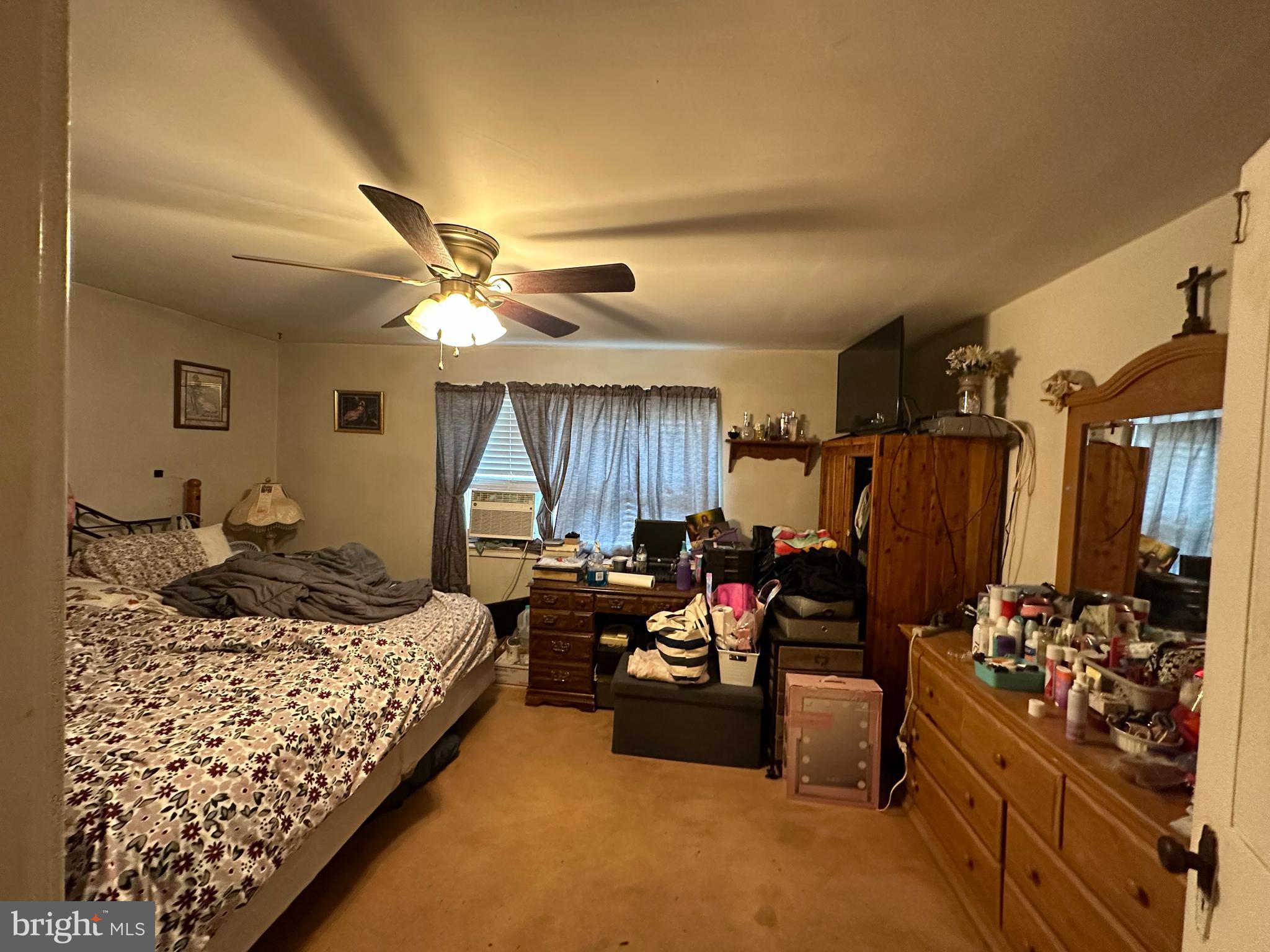 3024 Windish Street Philadelphia, PA 19152 - Photo 17 of 32 a bed room with a bed and a couch