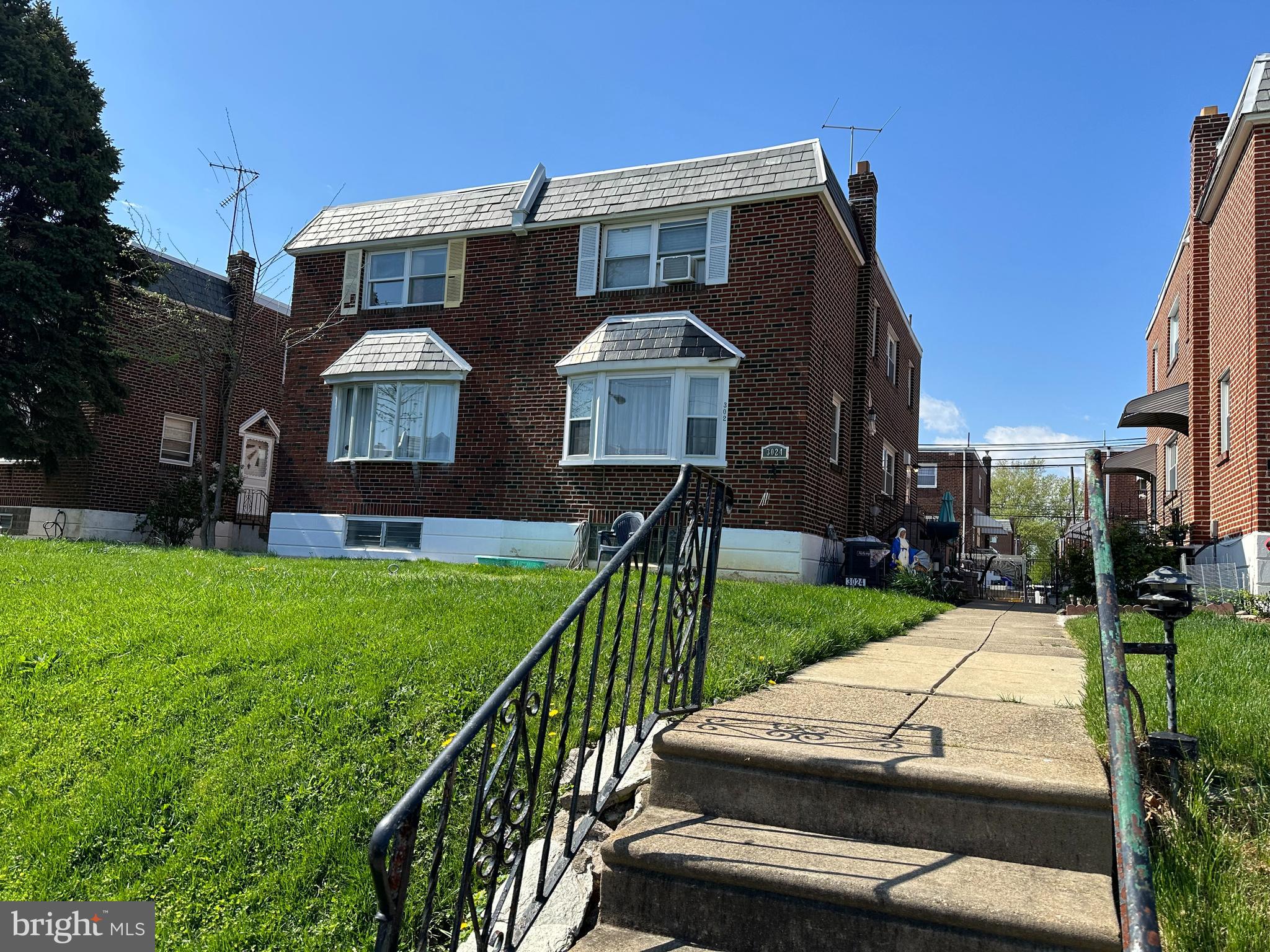 3024 Windish Street Philadelphia, PA 19152 - Photo 2 of 32 a front view of a house with garden