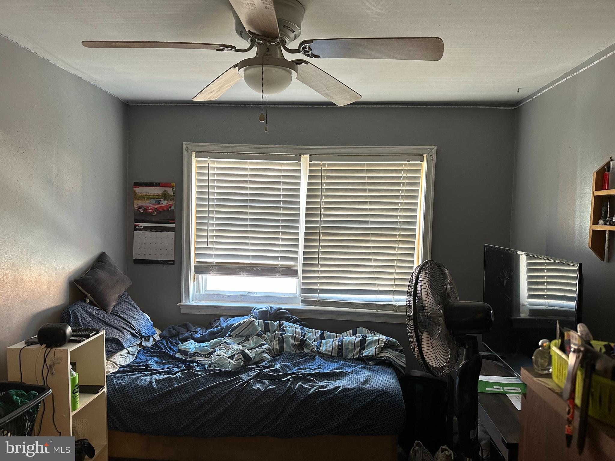 3024 Windish Street Philadelphia, PA 19152 - Photo 22 of 32 a bed sitting in a bedroom next to a window