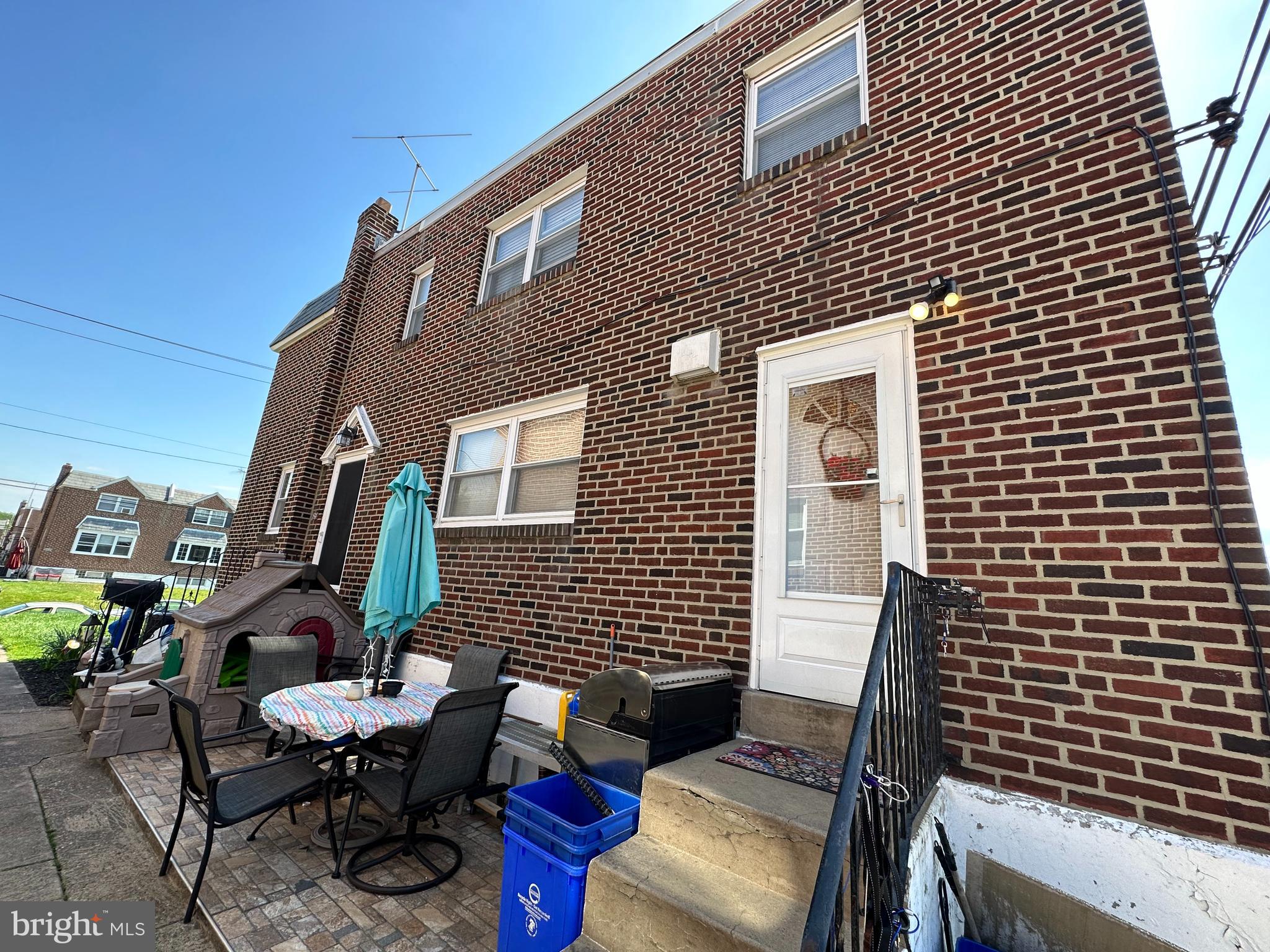 3024 Windish Street Philadelphia, PA 19152 - Photo 31 of 32 a backyard of a house with outdoor seating