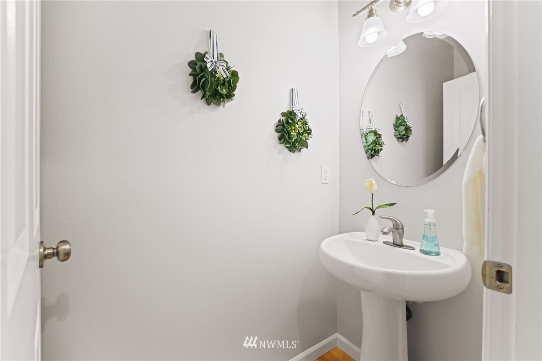 3007 182nd Place Southeast Bothell, WA 98012 - Photo 14 of 33 a bathroom with a sink and mirror