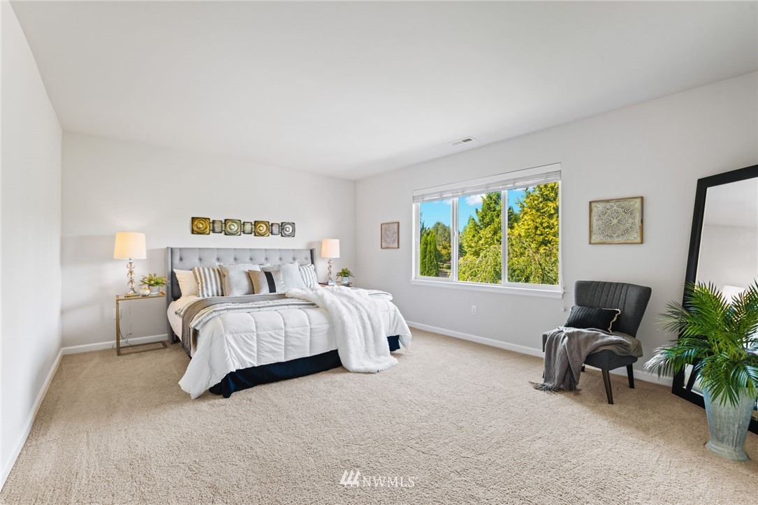 3007 182nd Place Southeast Bothell, WA 98012 - Photo 15 of 33 a bedroom with bed and a window