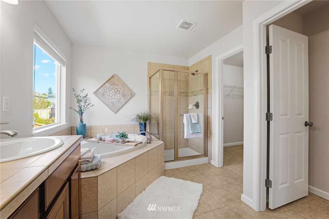 3007 182nd Place Southeast Bothell, WA 98012 - Photo 17 of 33 a bathroom with a sink and a mirror