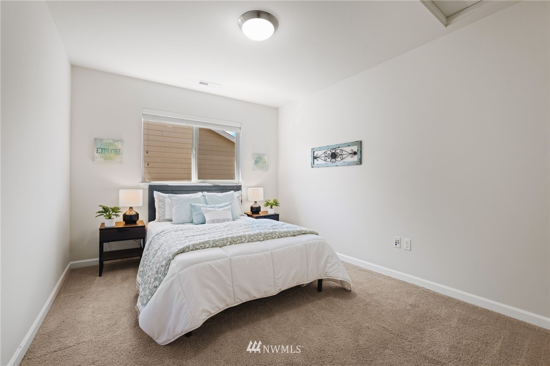 3007 182nd Place Southeast Bothell, WA 98012 - Photo 20 of 33 a bedroom with a bed and a window