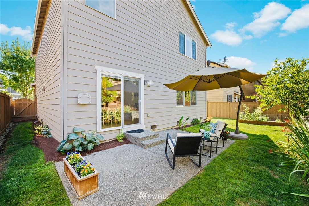 3007 182nd Place Southeast Bothell, WA 98012 - Photo 27 of 33 a view of a house with backyard and sitting area
