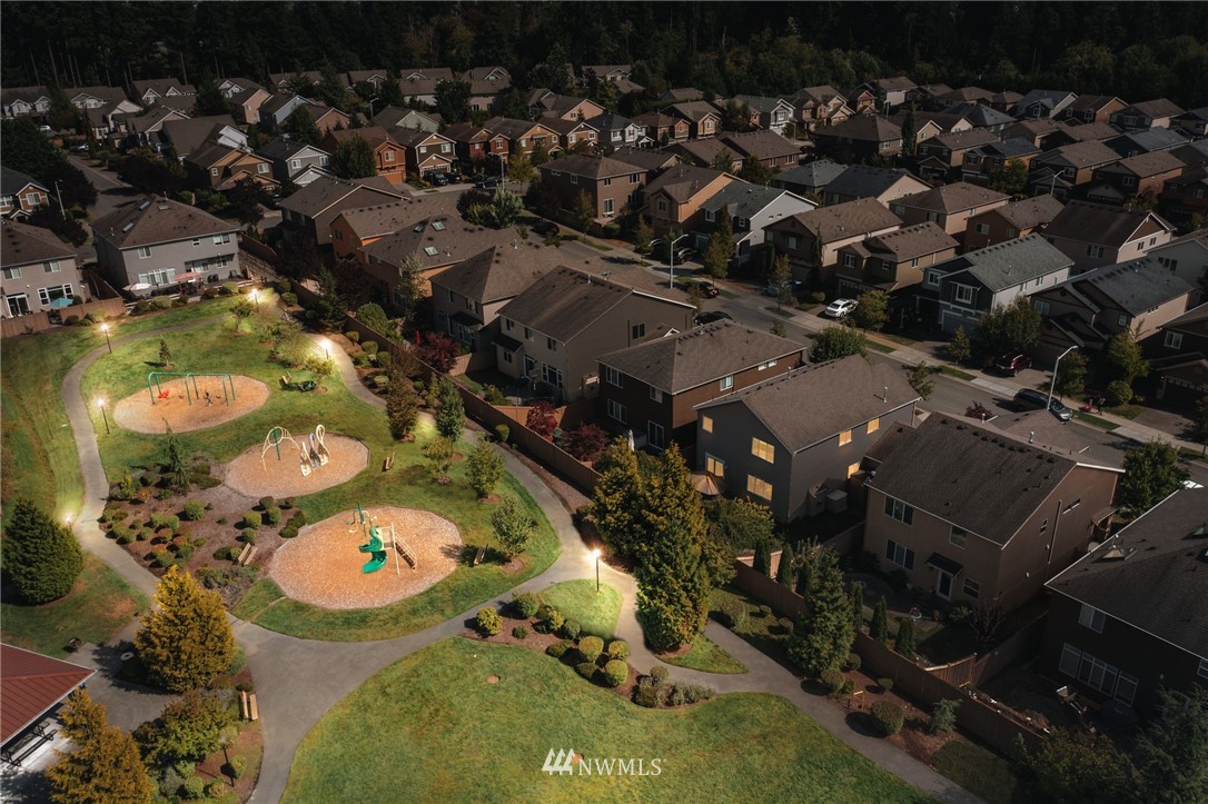 3007 182nd Place Southeast Bothell, WA 98012 - Photo 33 of 33 an aerial view of a house with a swimming pool yard and outdoor seating
