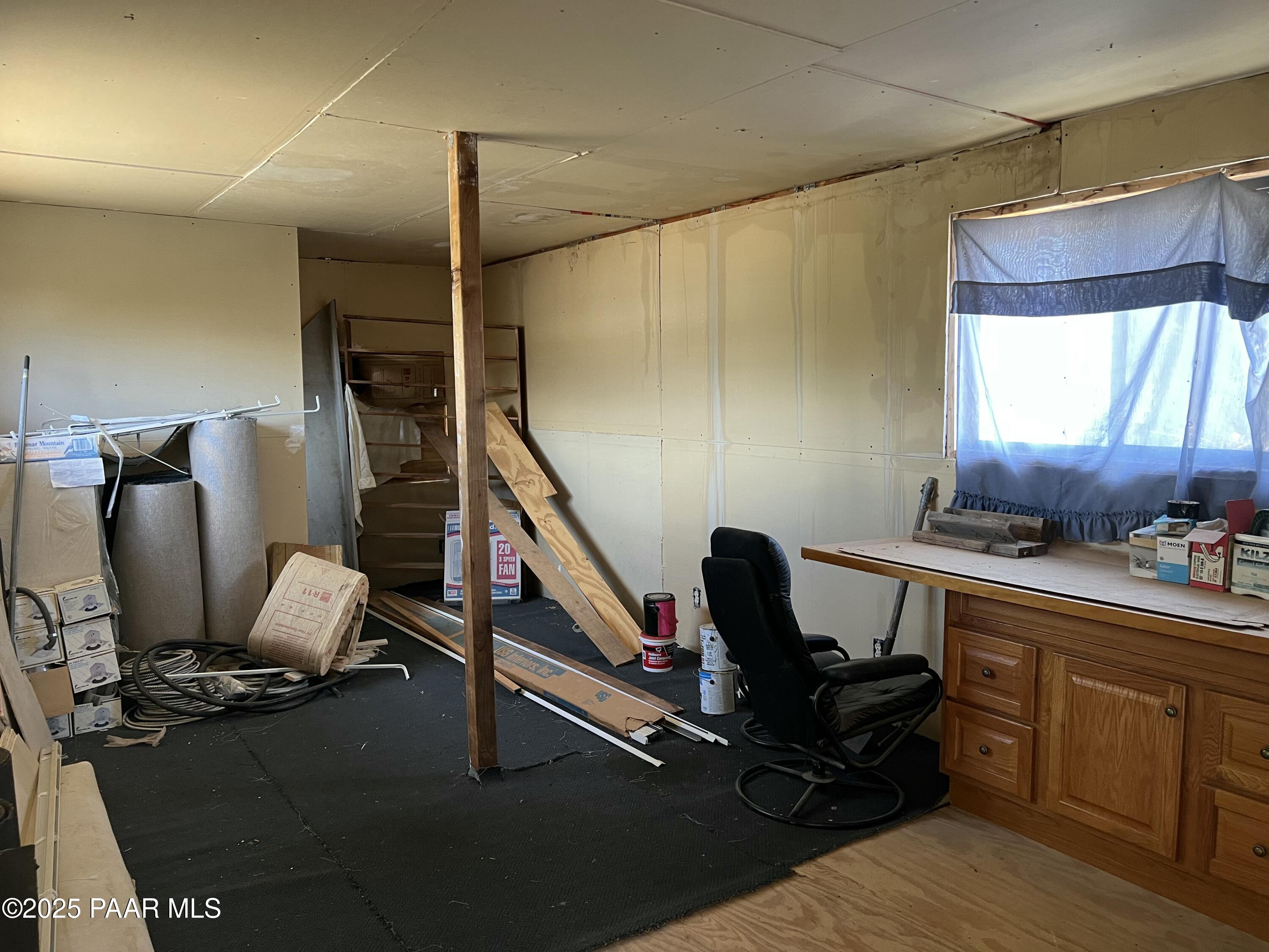 13338 East Main Street Mayer, AZ 86333 - Photo 12 of 15 a room with gym equipment and a window