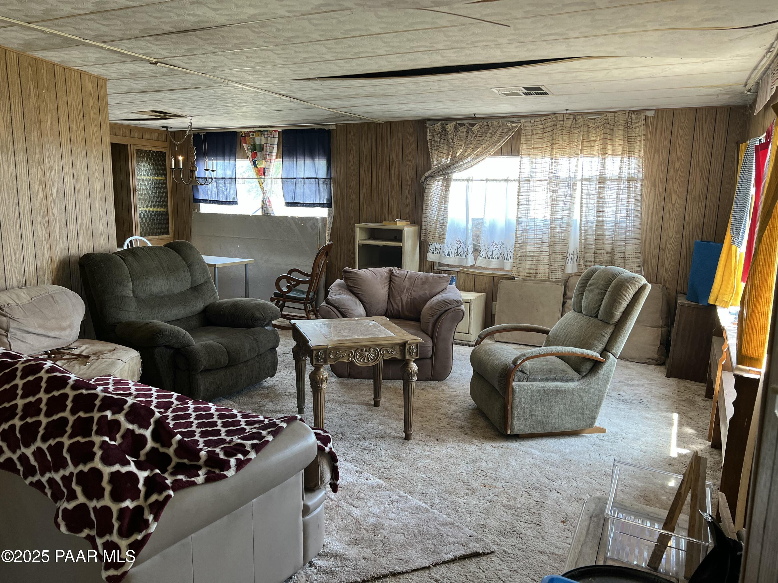 13338 East Main Street Mayer, AZ 86333 - Photo 3 of 15 a living room with furniture and a window