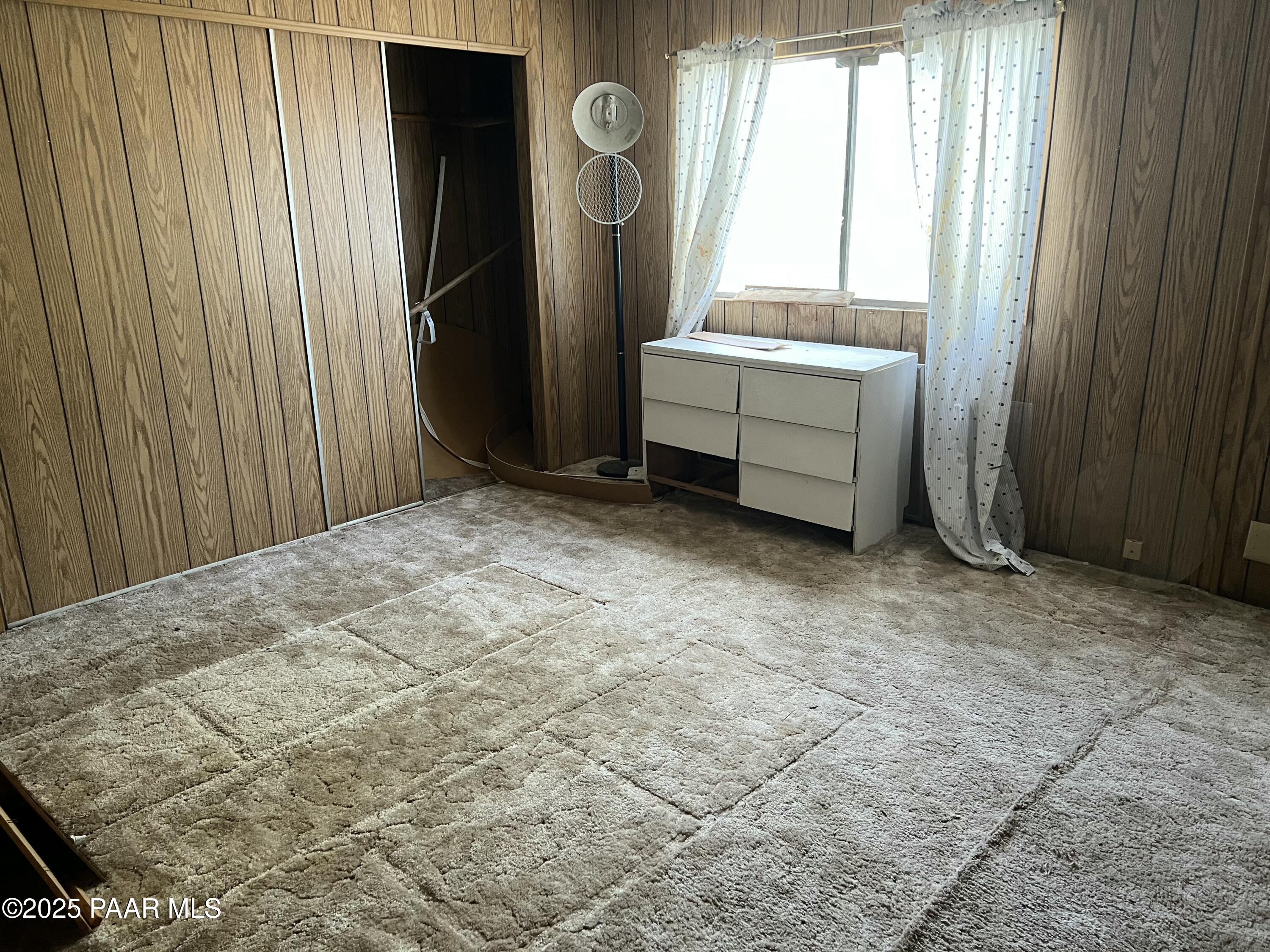 13338 East Main Street Mayer, AZ 86333 - Photo 9 of 15 a room with a window and a mirror