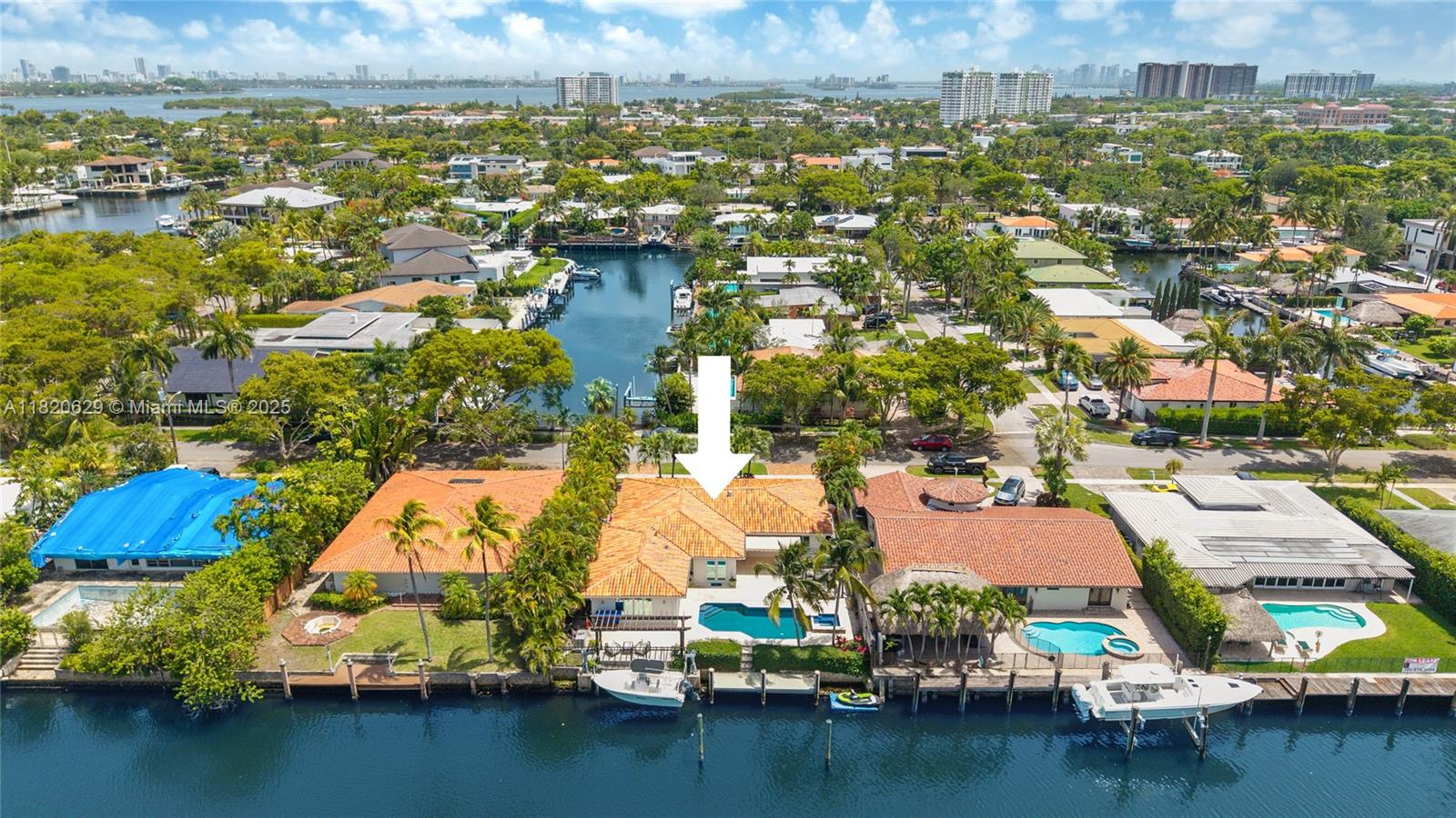 2085 Ixora Road North Miami, FL 33181 - Photo 25 of 28 an aerial view of residential houses with outdoor space