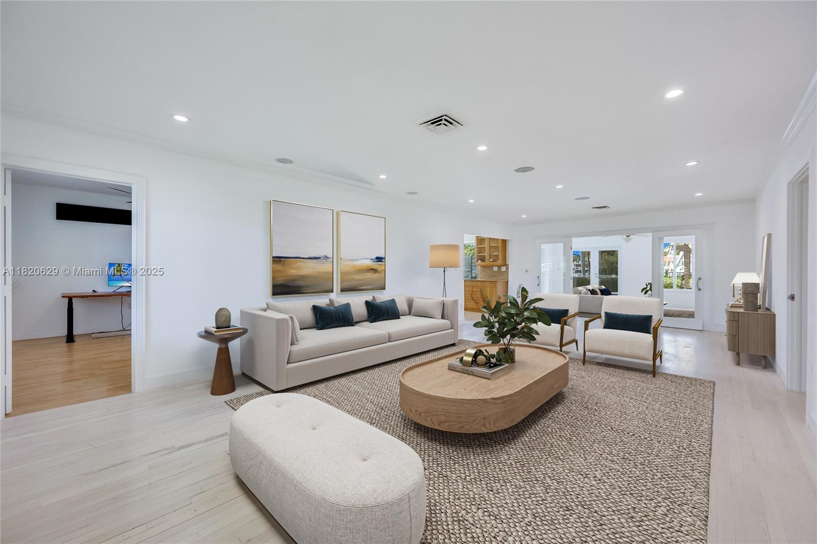2085 Ixora Road North Miami, FL 33181 - Photo 3 of 28 a living room with furniture and wooden floor