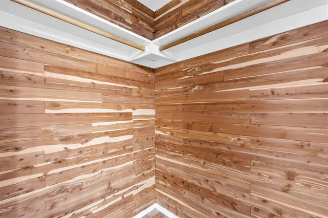 a view of a livingroom with furniture and hardwood floor