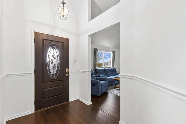 a house with trees in the background