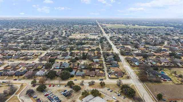 an aerial view of a residential houses