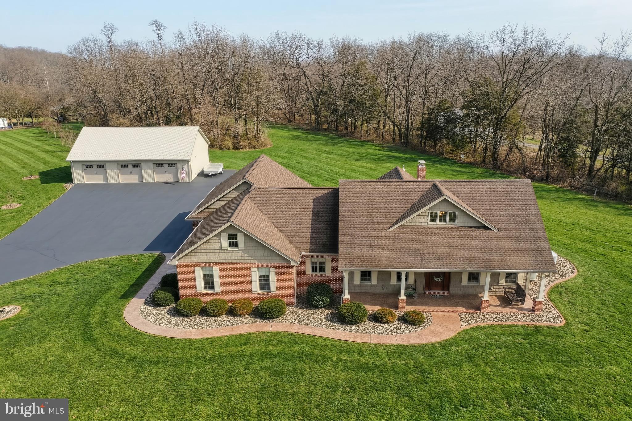 108 Pickett Road Dover, PA 17315 - Photo 12 of 64 a front view of a house with garden