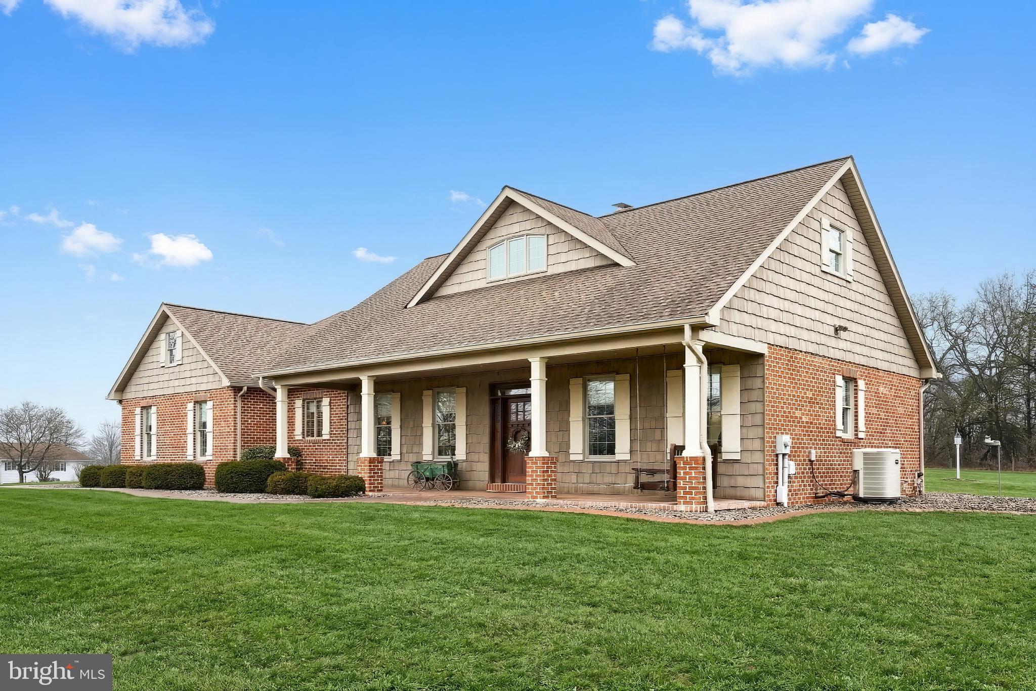 108 Pickett Road Dover, PA 17315 - Photo 13 of 64 a front view of a house with a yard