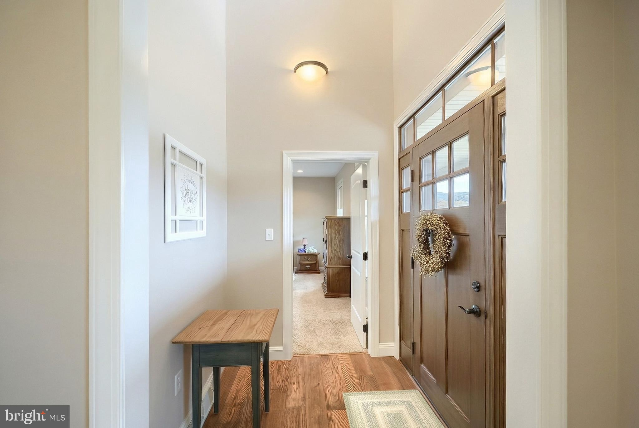 108 Pickett Road Dover, PA 17315 - Photo 27 of 64 a view of a hallway with bathroom and mirror