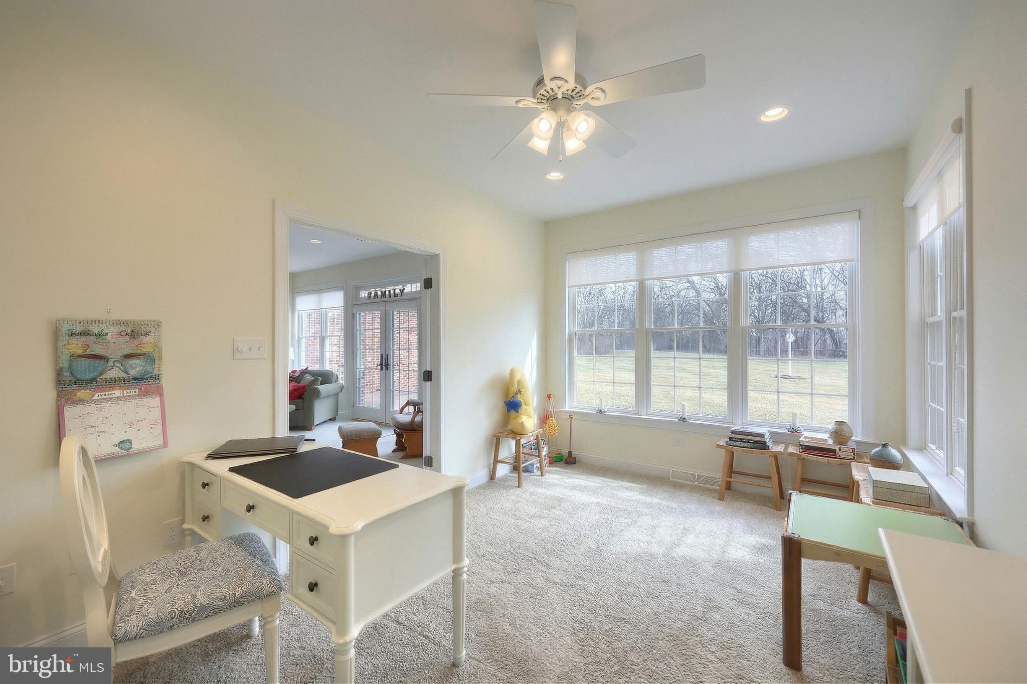 108 Pickett Road Dover, PA 17315 - Photo 34 of 64 a living room with furniture a table and a large window