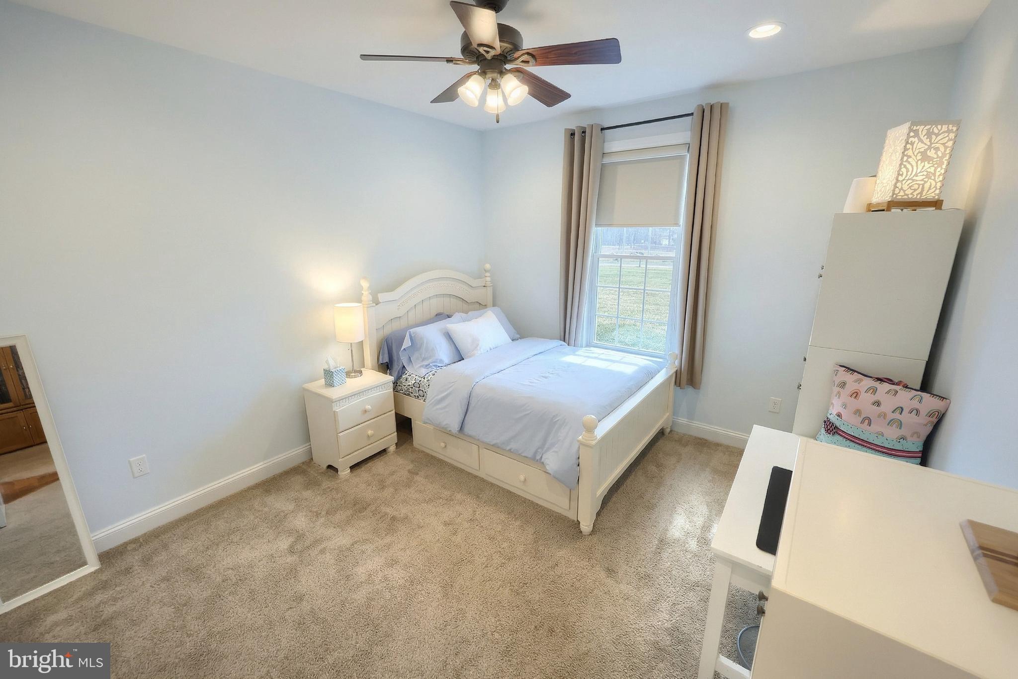 108 Pickett Road Dover, PA 17315 - Photo 37 of 64 a bedroom with a bed and a chandelier