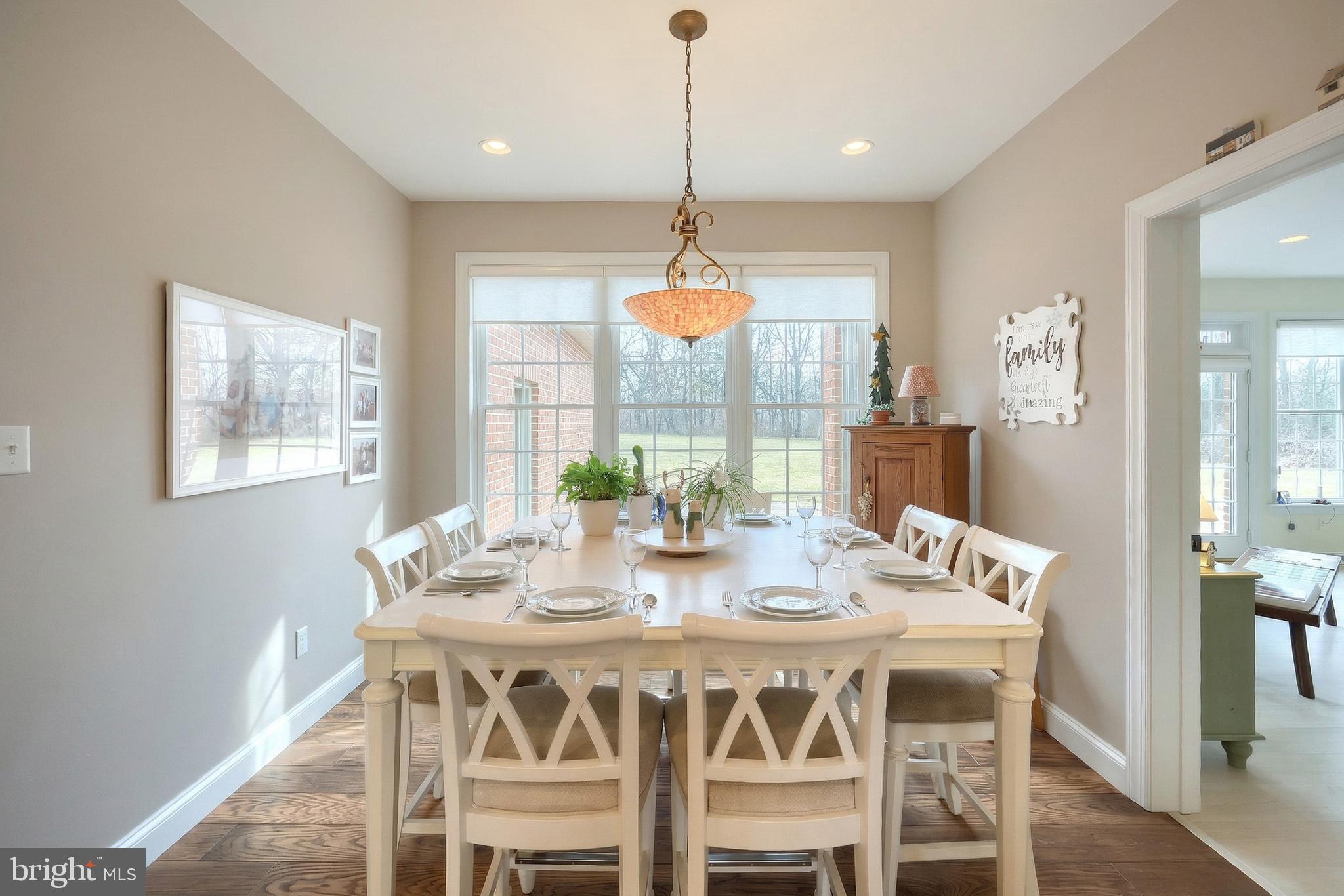 108 Pickett Road Dover, PA 17315 - Photo 48 of 64 a dining room with furniture a chandelier and wooden floor