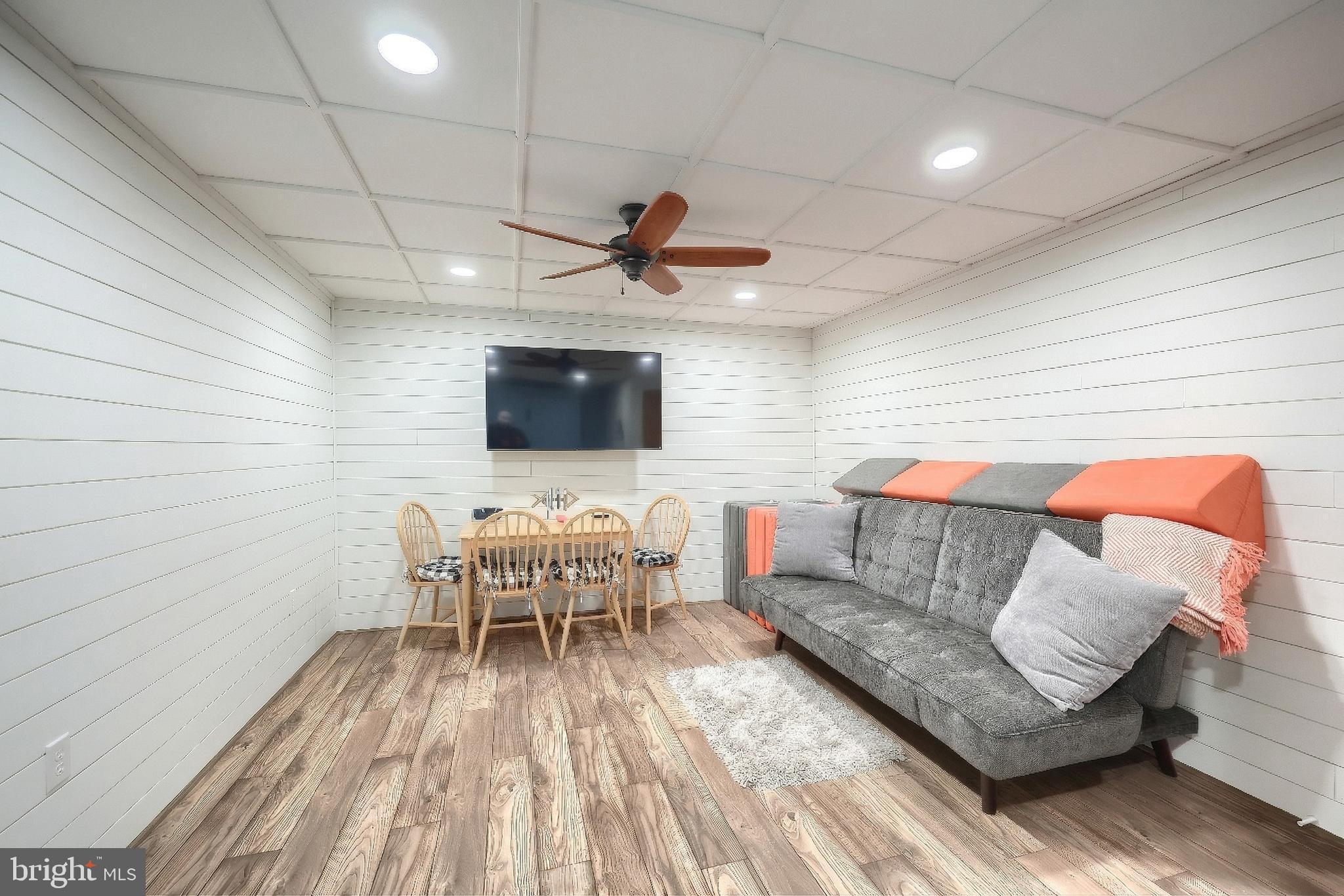 108 Pickett Road Dover, PA 17315 - Photo 56 of 64 a living room with furniture and a wooden floor
