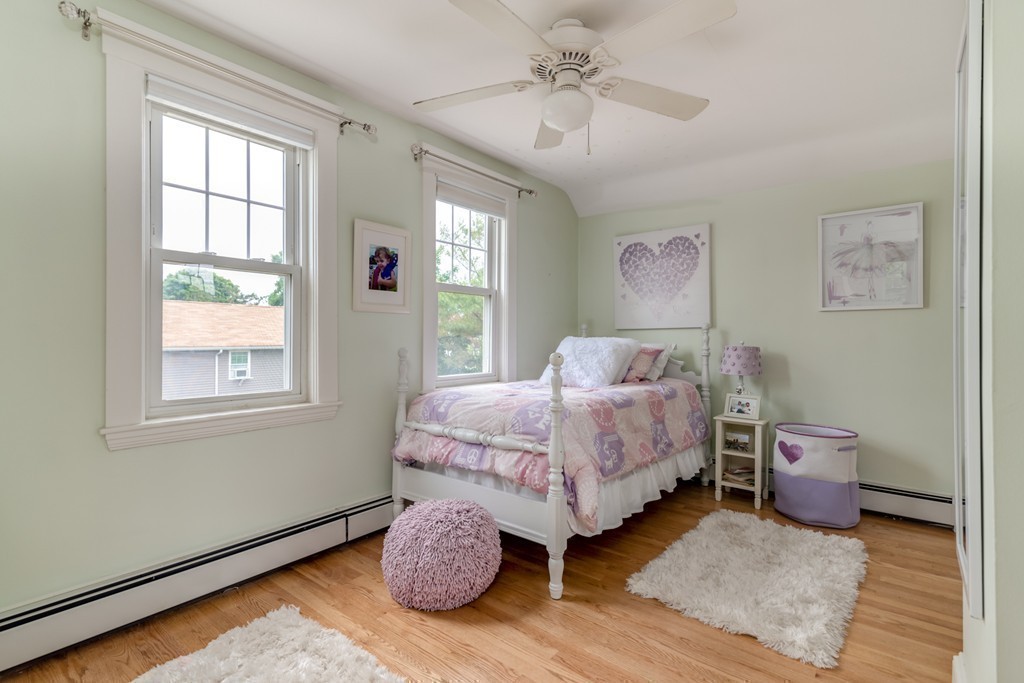 60 Kingsley Road Hull, MA 02045 - Photo 18 of 27 a bedroom with a bed and a window