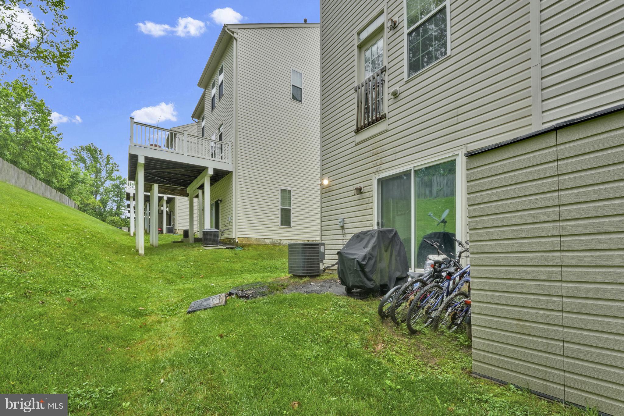 7138 Station House Road Elkridge, MD 21075 - Photo 42 of 42 a view of a house with a backyard