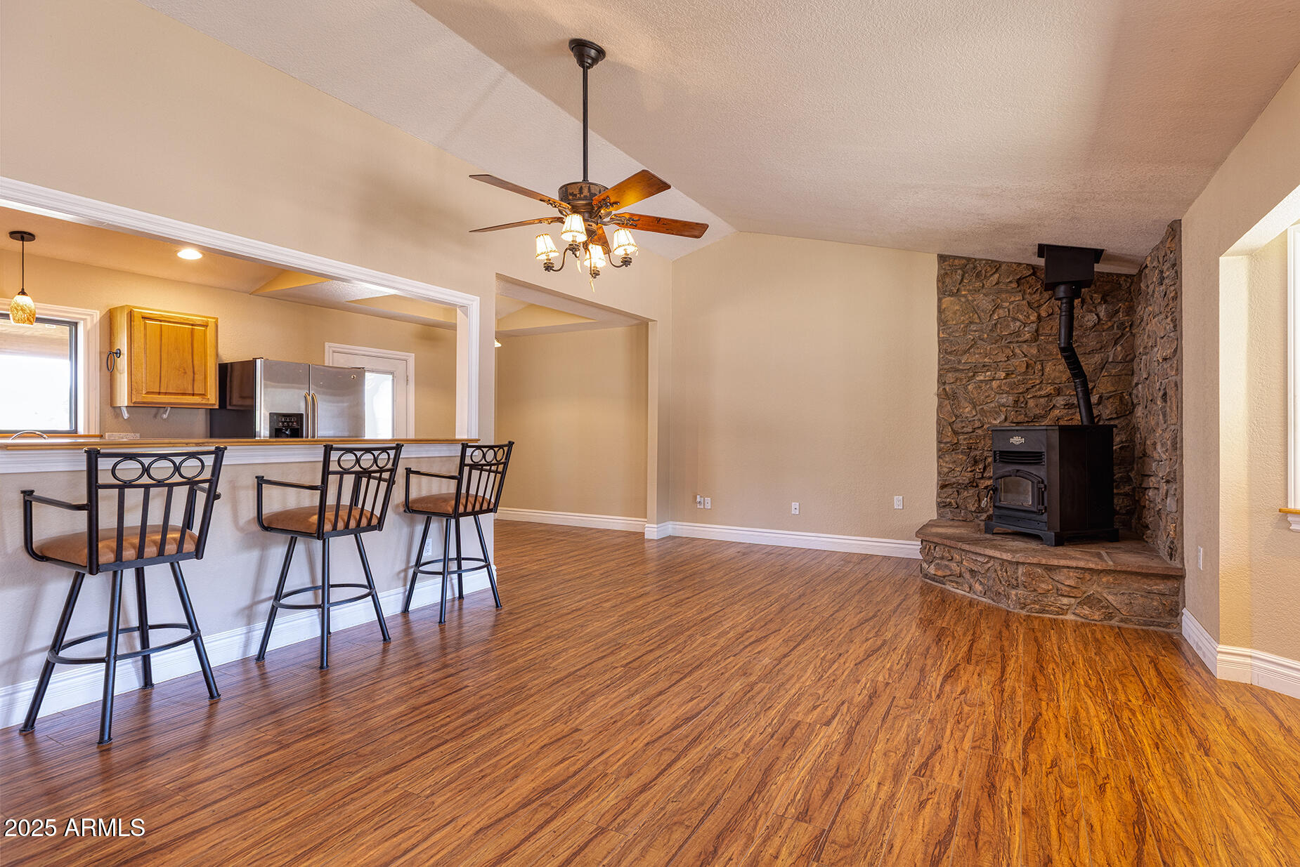 116 Skyhook Road Pinetop, AZ 85935 - Photo 12 of 32 a view of a livingroom with furniture and wooden floor