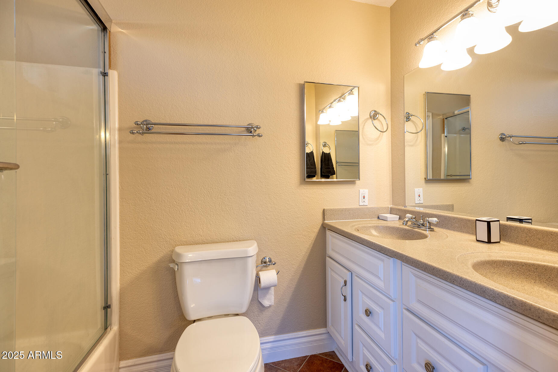 116 Skyhook Road Pinetop, AZ 85935 - Photo 22 of 32 a bathroom with a granite countertop toilet sink and a mirror