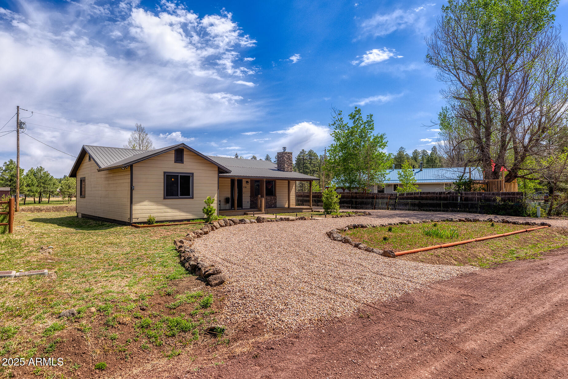 116 Skyhook Road Pinetop, AZ 85935 - Photo 4 of 32 a view of a house with swimming pool and sitting area