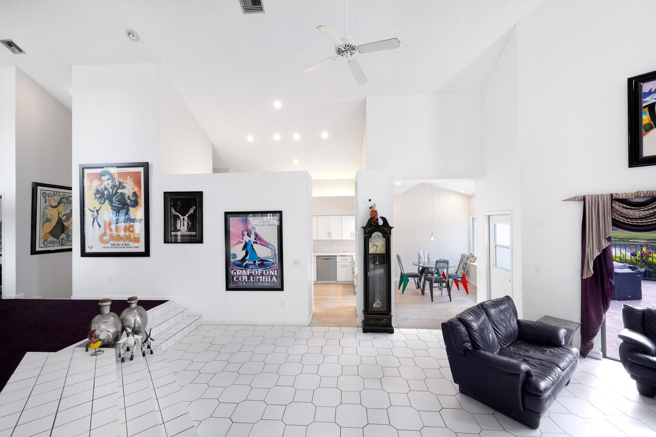 3740 Canterbury Way Boca Raton, FL 33434 - Photo 13 of 55 a living room with furniture and a couch